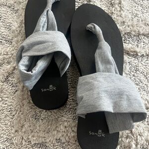 Gray Sanuk sling platforms